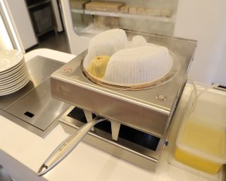 中華炒めもお任せあれ　スマート自動調理器で料理を標準化